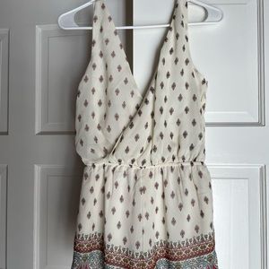 Chic romper with v neck top